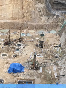 人工挖孔桩的井口上架着的那个像三脚架的设备叫什么名字 作用是什么 谢谢